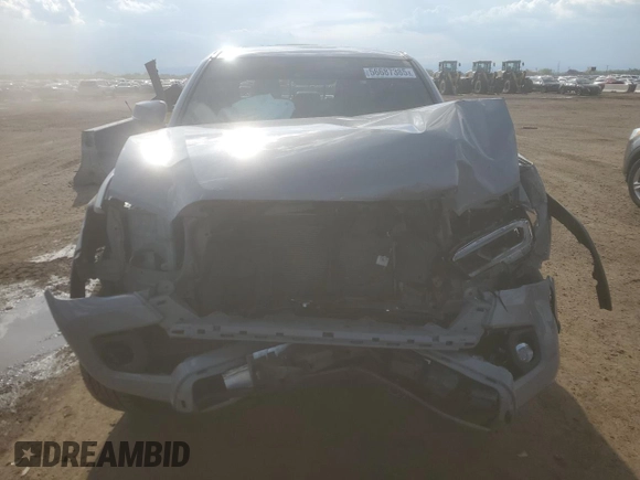 2021 Toyota Tacoma SR5 with VIN 3TMDZ5BN9MM099515, listed as a Copart auction lot 56687385 with 66,721 mi miles and Salvage title. Bid and sale history available at DreamBid. Image 5.
