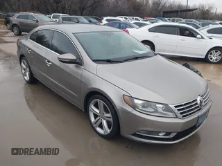 2013 Volkswagen CC Sport with VIN WVWBN7AN5DE514299, listed as a IAAI auction lot 41563521 with 199,249 mi miles. Bid and sale history available at carsss.com. Image 1.