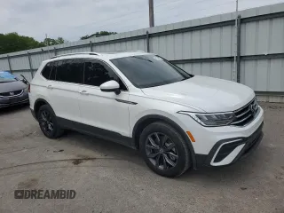 2023 Volkswagen Tiguan SE with VIN 3VVNB7AX9PM029204, listed as a Copart auction lot 58340285 with 13,693 mi miles and Salvage title. Bid and sale history available at DreamBid. Image 4.