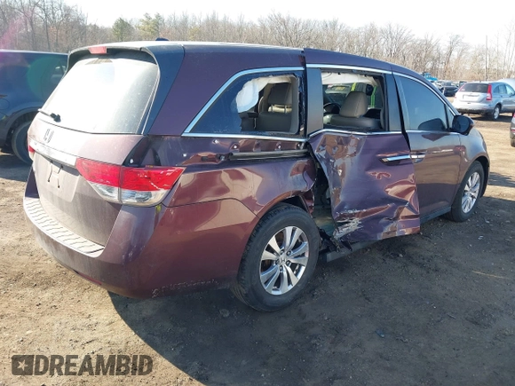2014 Honda Odyssey EX-L with VIN 5FNRL5H60EB009083, listed as a IAAI auction lot 41633419 with 219,930 mi miles and . Bid and sale history available at carsss.com. Image 4.