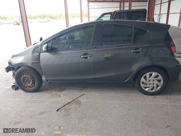 2015 Toyota Prius c One with VIN JTDKDTB38F1115180, listed as a IAAI auction lot 41875654 with 227,356 mi miles. Bid and sale history available at carsss.com. Image 14.