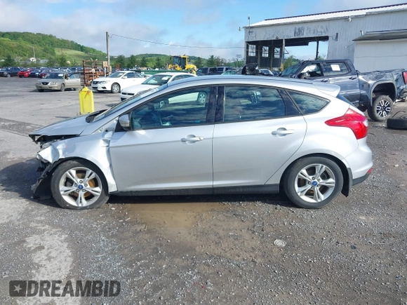 2012 Ford Focus SE z VIN 1FAHP3K27CL241013, wystawiony jako IAAI lot #42198812 z przebiegiem 121 888 mil mil oraz . Historia ofert i sprzedaży dostępna na DreamBid. Obrazek 15.