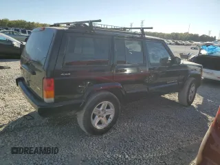 2001 Jeep Cherokee Sport z VIN 1J4FF58S61L612533, wystawiony jako Copart lot #76824714 z przebiegiem 62 401 mil mil oraz Szkoda całkowita • Salvage title. Historia ofert i sprzedaży dostępna na DreamBid. Obrazek 3.