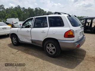 2004 Hyundai Santa Fe z VIN KM8SB12B04U640985, wystawiony jako Copart lot #56584595 z przebiegiem 239 527 mil mil oraz Szkoda całkowita • Salvage title. Historia ofert i sprzedaży dostępna na DreamBid. Obrazek 2.