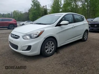 2014 Hyundai Accent GS z VIN KMHCT5AE1EU153994, wystawiony jako Copart lot #57445705 z przebiegiem 268 037 mil mil oraz Czysty tytuł • Clean title. Historia ofert i sprzedaży dostępna na DreamBid. Obrazek 1.