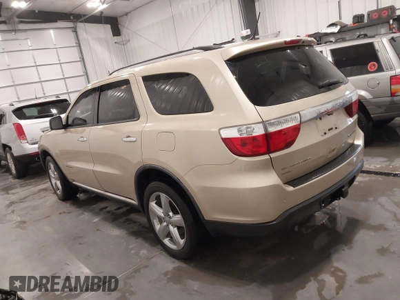 2011 Dodge Durango Citadel with VIN 1D4RE5GG7BC695817, listed as a IAAI auction lot 41596051 with 196,661 mi miles. Bid and sale history available at carsss.com. Image 3.