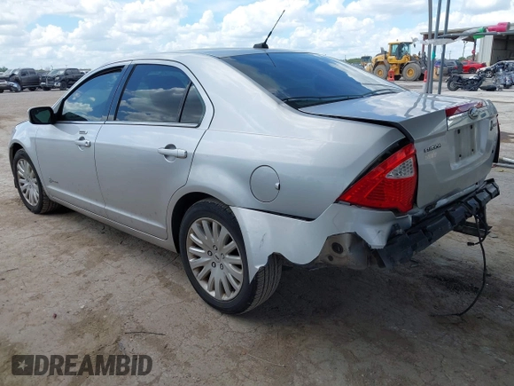 2012 Ford Fusion Hybrid с VIN 3FADP0L36CR426322, выставлен на аукционе IAAI как лот 42592635 с пробегом 151 941 миль миль и . История ставок и продаж доступна на DreamBid. Изображение 3.