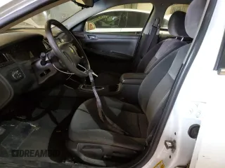 2015 Chevrolet Impala LS with VIN 2G1WA5E38F1124997, listed as a Copart auction lot 53738225 with 129,678 mi miles and Salvage title. Bid and sale history available at DreamBid. Image 7.