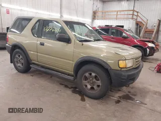 1999 Isuzu Rodeo with VIN 4S2CK57W6X4316539, listed as a IAAI auction lot 42267214 with 186,480 mi miles and . Bid and sale history available at DreamBid. Image 1.