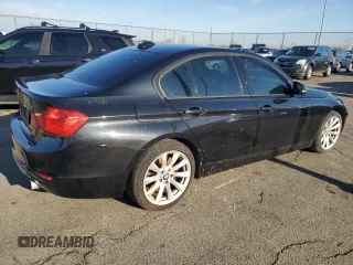 2013 BMW 3 Series 335i xDrive with VIN WBA3B9C57DF585680, listed as a Copart auction lot 50762415 with 122,817 mi miles and Clean Title. Bid and sale history available at carsss.com. Image 3.