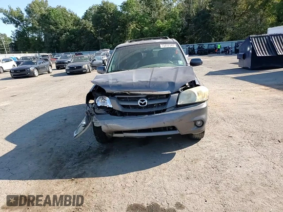 2006 Mazda Tribute S with VIN 4F2YZ06136KM31485, listed as a Copart auction lot 75412344 with Not Provided miles and Salvage Title. Bid and sale history available at DreamBid. Image 11.
