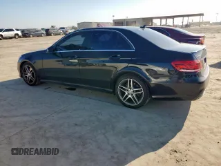 2014 Mercedes-Benz E 350 Luxury with VIN WDDHF8JB5EB041578, listed as a Copart auction lot 61388795 with 138,137 mi miles and Clean title. Bid and sale history available at DreamBid. Image 2.