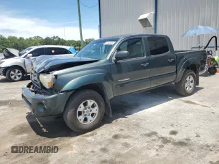 2010 Toyota Tacoma PreRunner with VIN 3TMJU4GN2AM095001, listed as a Copart auction lot 61641885 with 102,266 mi miles and Salvage title. Bid and sale history available at DreamBid. Image 1.