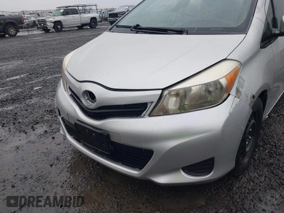 2013 Toyota Yaris L with VIN JTDKTUD32DD553842, listed as a IAAI auction lot 41231910 with 155,158 mi miles. Bid and sale history available at carsss.com. Image 6.