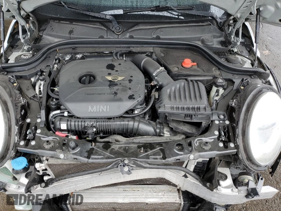 2014 MINI Hardtop S with VIN WMWXM7C57ET985421, listed as a Copart auction lot 49443335 with 76,168 mi miles and Salvage Title. Bid and sale history available at DreamBid. Image 13.
