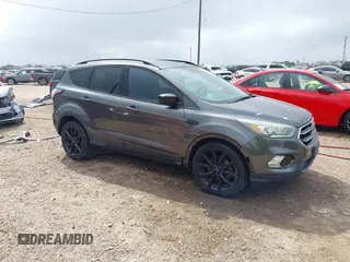 2017 Ford Escape SE with VIN 1FMCU0G99HUC65571, listed as a IAAI auction lot 41923517 with 77,179 mi miles and . Bid and sale history available at DreamBid. Image 1.