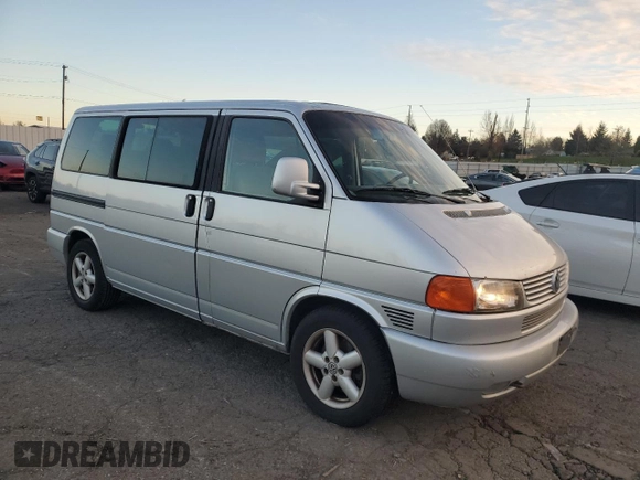 2003 Volkswagen EuroVan MV с VIN WV2MB47053H002505, выставлен на аукционе Copart как лот 83840884 с пробегом 250 786 миль миль и Чистый • Clean title. История ставок и продаж доступна на DreamBid. Изображение 4.