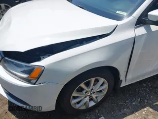 2014 Volkswagen Jetta SE with VIN 3VWD17AJ5EM437072, listed as a IAAI auction lot 42463048 with 99,030 mi miles and . Bid and sale history available at DreamBid. Image 13.