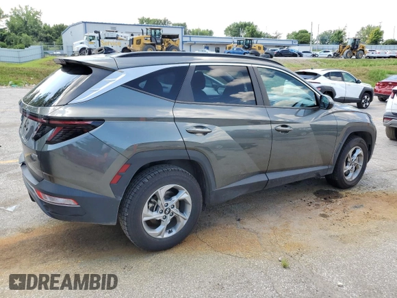 2023 Hyundai Tucson SEL with VIN 5NMJBCAEXPH209637, listed as a Copart auction lot 63222495 with 62,009 mi miles and Clean title. Bid and sale history available at DreamBid. Image 3.