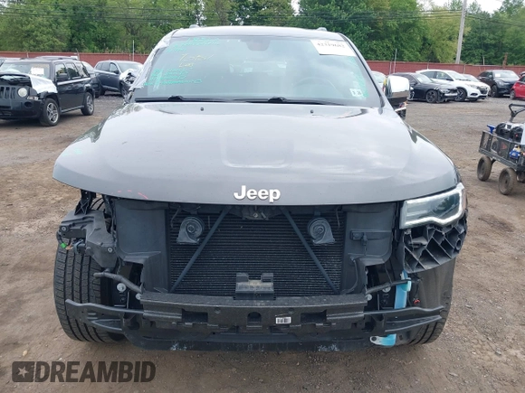 2021 Jeep Grand Cherokee 80th Anniversary with VIN 1C4RJFBG4MC669104, listed as a IAAI auction lot 42319682 with 37,397 mi miles and . Bid and sale history available at DreamBid. Image 12.