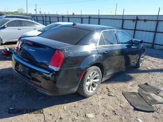 2016 Chrysler 300 Anniversary Edition with VIN 2C3CCAAGXGH261376, listed as a IAAI auction lot 41833894 with 64,489 mi miles and . Bid and sale history available at DreamBid. Image 4.