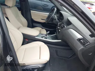 2015 BMW X4 xDrive28i with VIN 5UXXW3C54F0M88740, listed as a IAAI auction lot 42275157 with 159,281 mi miles and . Bid and sale history available at DreamBid. Image 5.
