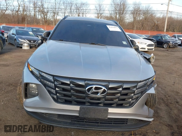 2022 Hyundai Tucson SEL with VIN 5NMJFCAE4NH060031, listed as a IAAI auction lot 41451874 with 57,228 mi miles and . Bid and sale history available at carsss.com. Image 12.