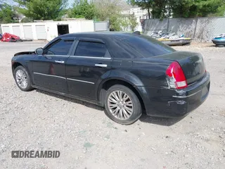 2006 Chrysler 300 Touring with VIN 2C3KA53G36H220558, listed as a IAAI auction lot 42159373 with 158,970 mi miles. Bid and sale history available at carsss.com. Image 3.