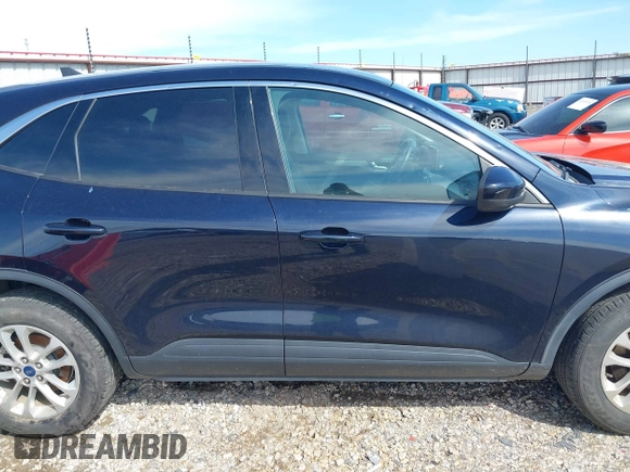 2021 Ford Escape SE z VIN 1FMCU9G67MUA39792, wystawiony jako IAAI lot #42091121 z przebiegiem 135 920 mil mil oraz . Historia ofert i sprzedaży dostępna na DreamBid. Obrazek 13.