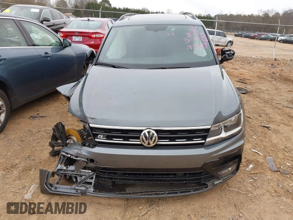 2020 Volkswagen Tiguan SE with VIN 3VV3B7AX7LM163193, listed as a IAAI auction lot 41751571 with 32,352 mi miles and . Bid and sale history available at DreamBid. Image 13.
