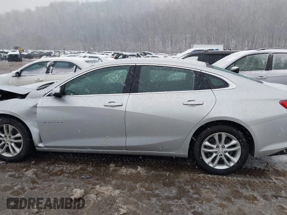 2018 Chevrolet Malibu LT z VIN 1G1ZD5STXJF269890, wystawiony jako IAAI lot #41504935 z przebiegiem 107 190 mil mil oraz . Historia ofert i sprzedaży dostępna na DreamBid. Obrazek 14.