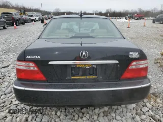 2004 Acura RL w/Navigation System z VIN JH4KA96664C007799, wystawiony jako Copart lot #44207245 z przebiegiem 215 098 mil mil oraz Szkoda całkowita • Salvage title. Historia ofert i sprzedaży dostępna na DreamBid. Obrazek 6.