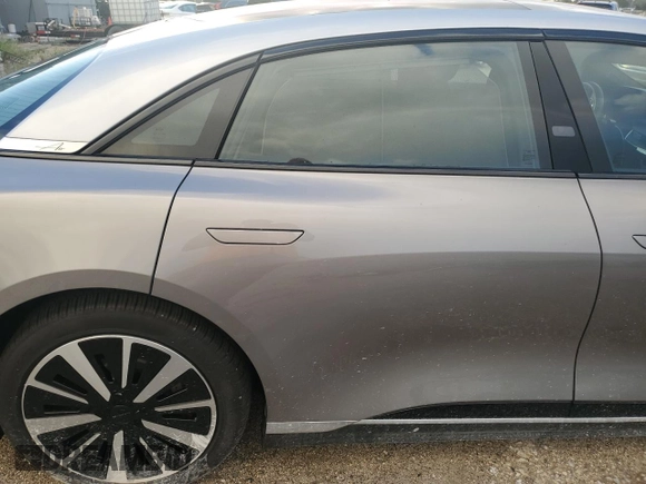 2023 Lucid Air Touring z VIN 50EA1TEA5PA004467, wystawiony jako Copart lot #76620154 z przebiegiem 6 108 mil mil oraz Szkoda całkowita • Salvage title. Historia ofert i sprzedaży dostępna na DreamBid. Obrazek 10.