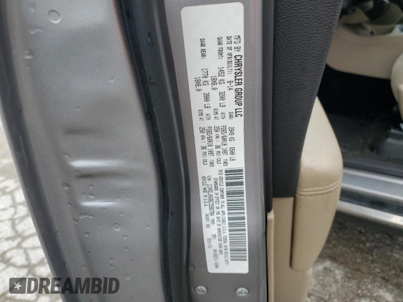 2014 Dodge Durango SXT z VIN 1C4RDJAG8EC596784, wystawiony jako Copart lot #57682215 z przebiegiem 142 008 mil mil oraz Szkoda całkowita • Salvage title. Historia ofert i sprzedaży dostępna na DreamBid. Obrazek 12.