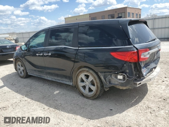 2018 Honda Odyssey EX-L with VIN 5FNRL6H77JB009851, listed as a Copart auction lot 52203155 with 127,575 mi miles and Salvage Title. Bid and sale history available at carsss.com. Image 2.