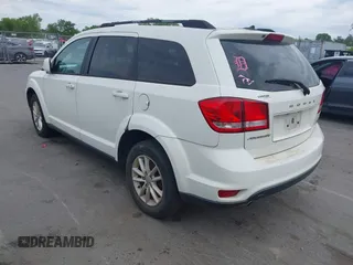 2017 Dodge Journey SXT with VIN 3C4PDCBG4HT572573, listed as a IAAI auction lot 42036006 with 209,854 mi miles and . Bid and sale history available at DreamBid. Image 3.