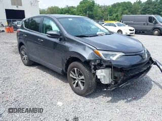 2018 Toyota RAV4 XLE with VIN 2T3WFREV0JW410652, listed as a IAAI auction lot 42716141 with 67,099 mi miles and . Bid and sale history available at DreamBid. Image 1.