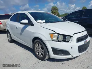 2015 Chevrolet Sonic LT with VIN 1G1JC5SH1F4148308, listed as a IAAI auction lot 40091320 with 103,815 mi miles. Bid and sale history available at carsss.com. Image 1.