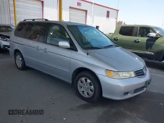 2004 Honda Odyssey EX-L z VIN 5FNRL18064B050756, wystawiony jako IAAI lot #42396762 z przebiegiem 223 607 mil mil oraz . Historia ofert i sprzedaży dostępna na DreamBid. Obrazek 1.