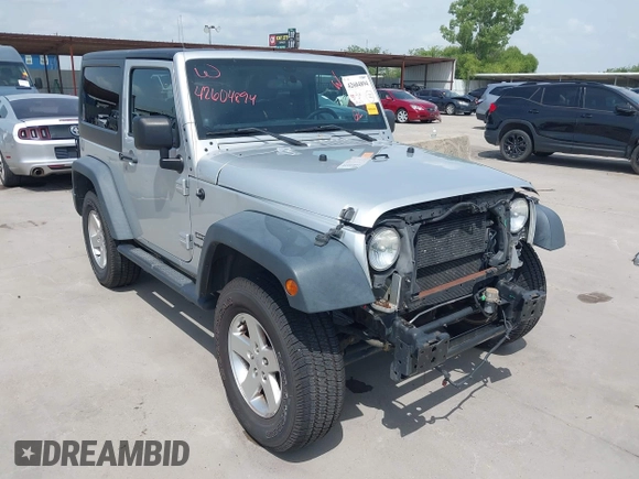 2012 Jeep Wrangler Sport с VIN 1C4AJWAG0CL273233, выставлен на аукционе IAAI как лот 42604894 с пробегом 119 103 миль миль и . История ставок и продаж доступна на DreamBid. Изображение 1.