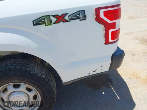 2018 Ford F-150 XL with VIN 1FTFX1E5XJKD86996, listed as a IAAI auction lot 42256819 with 141,798 mi miles and . Bid and sale history available at DreamBid. Image 6.