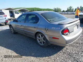 2001 Nissan Maxima GLE z VIN JN1CA31A41T304048, wystawiony jako IAAI lot #42170749 z przebiegiem 215 284 mil mil oraz . Historia ofert i sprzedaży dostępna na DreamBid. Obrazek 3.