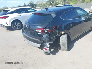 2015 Mazda 3 i Grand Touring z VIN 3MZBM1M73FM145336, wystawiony jako IAAI lot #42227676 z przebiegiem Nie podano mil oraz . Historia ofert i sprzedaży dostępna na DreamBid. Obrazek 6.