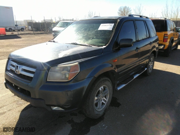 2006 Honda Pilot EX-L with VIN 2HKYF18586H514424, listed as a IAAI auction lot 41663778 with 210,020 mi miles. Bid and sale history available at carsss.com. Image 2.