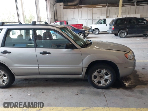 2007 Subaru Forester X z VIN JF1SG63657H732102, wystawiony jako IAAI lot #42141332 z przebiegiem 202 943 mil mil oraz . Historia ofert i sprzedaży dostępna na DreamBid. Obrazek 13.