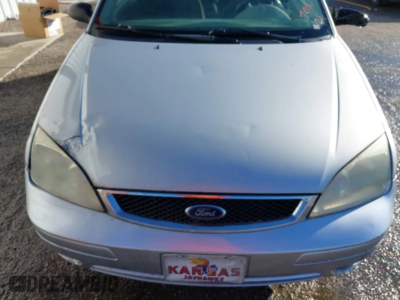 2007 Ford Focus S with VIN 1FAFP31N97W218727, listed as a IAAI auction lot 41001411 with 135,456 mi miles and . Bid and sale history available at carsss.com. Image 10.