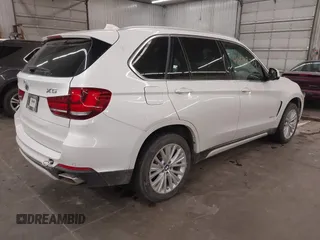 2016 BMW X5 xDrive40e with VIN 5UXKT0C50G0S77165, listed as a IAAI auction lot 40688779 with 110,317 mi miles and . Bid and sale history available at carsss.com. Image 4.