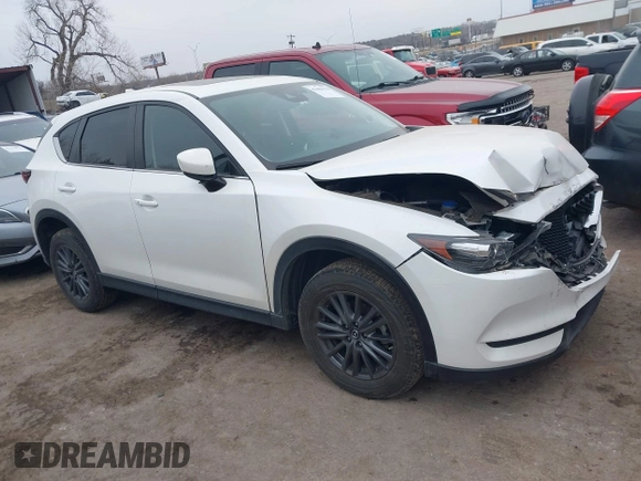 2021 Mazda CX-5 Touring with VIN JM3KFACM0M0412718, listed as a IAAI auction lot 41486753 with 41,496 mi miles. Bid and sale history available at carsss.com. Image 13.