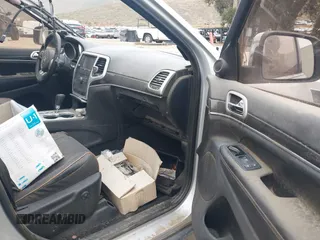 2011 Jeep Grand Cherokee Laredo with VIN 1J4RS4GG1BC646719, listed as a IAAI auction lot 42056300 with Not Provided miles and . Bid and sale history available at DreamBid. Image 5.