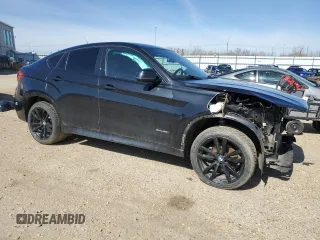 2018 BMW X6 xDrive35i z VIN 5UXKU2C52J0X51407, wystawiony jako Copart lot #54449325 z przebiegiem 125 767 mil mil oraz Szkoda całkowita • Salvage title. Historia ofert i sprzedaży dostępna na DreamBid. Obrazek 4.